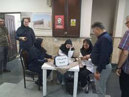 برپایی میز خدمت مرکز بهداشت جنوب تهران به مناسبت روز جهانی فشارخون در منطقه مرتضی گرد